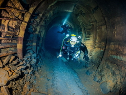 A tunnel in an old slate mine in Germany. by Brenda De Vries 